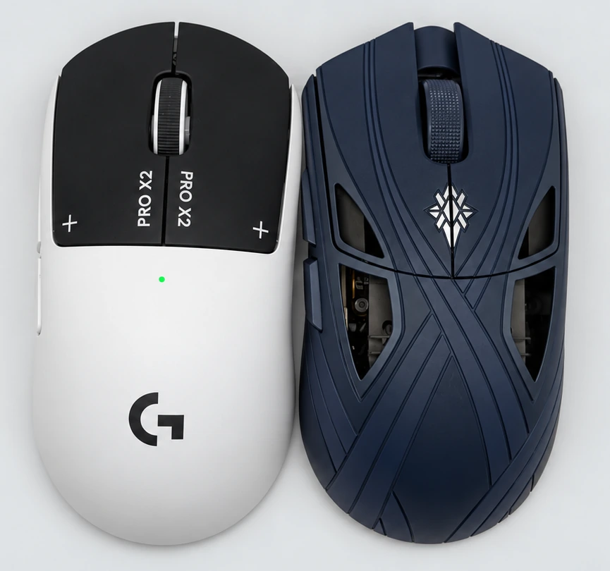 Finalmouse SLX next to a Logitech G PRO X2 SUPERSTRIKE for size and shape comparison